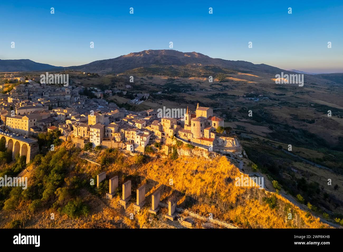 Aerial view of the ancient town of Petralia Soprana, built on a cliff, at sunset. Palermo district, Sicily, Italy. Stock Photo