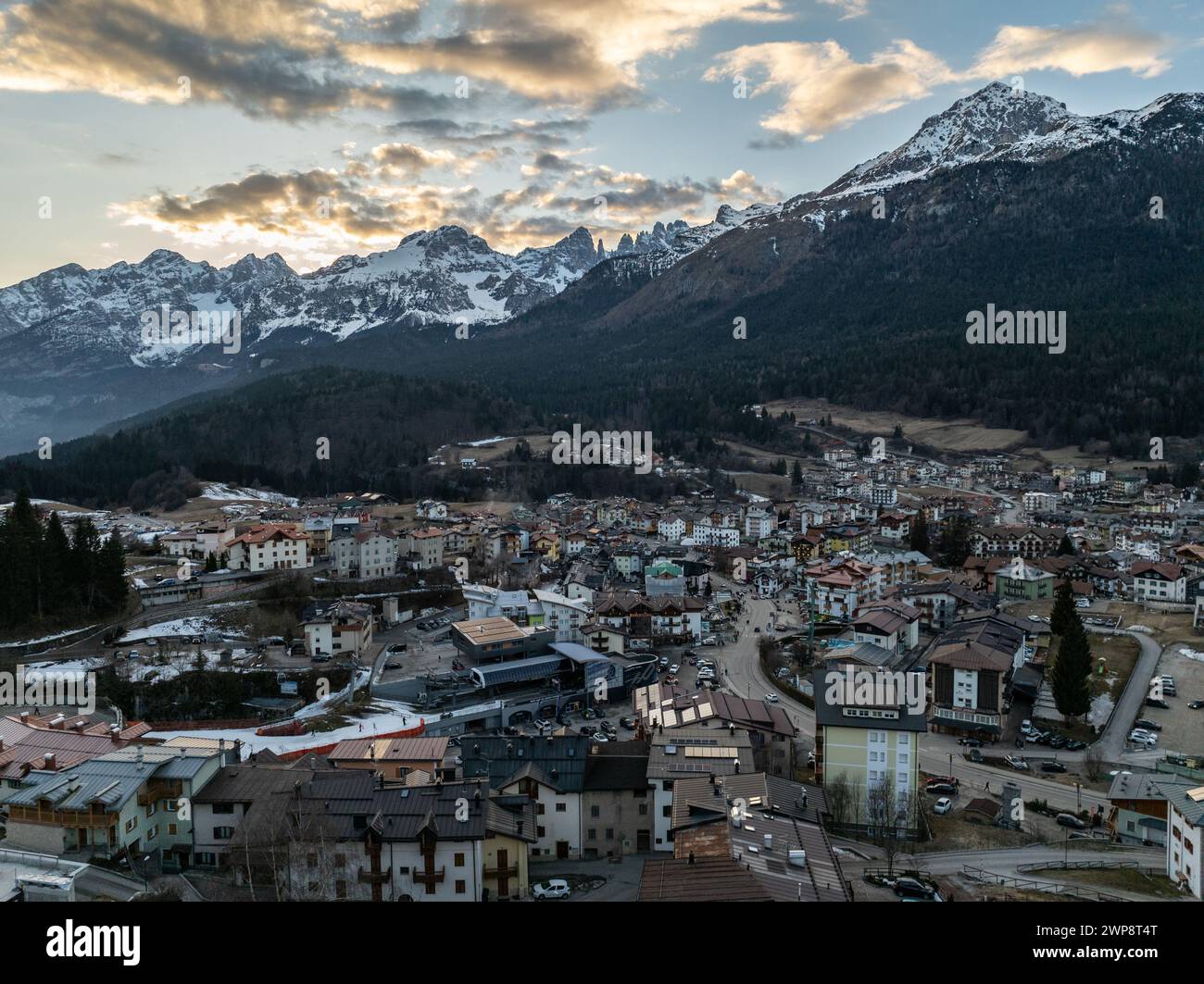Aerial drone view of Andalo town with mountains background in winter. Ski resort Paganella Andalo, Trentino-Alto Adige, Italy., Italian Dolomites,.Pag Stock Photo