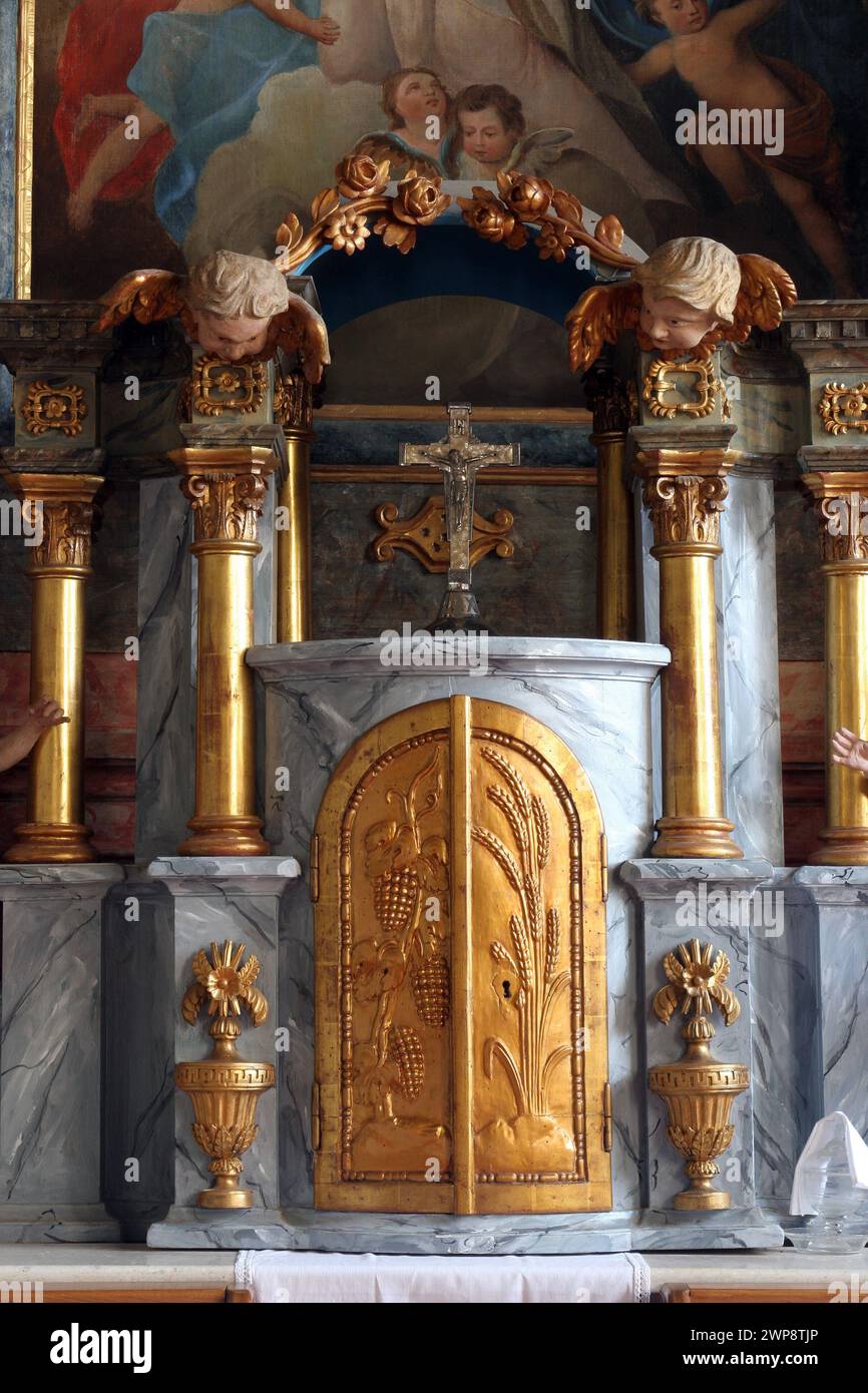 Tabernacle on the main altar in the parish church of the Holy Trinity in Klenovnik, Croatia Stock Photo