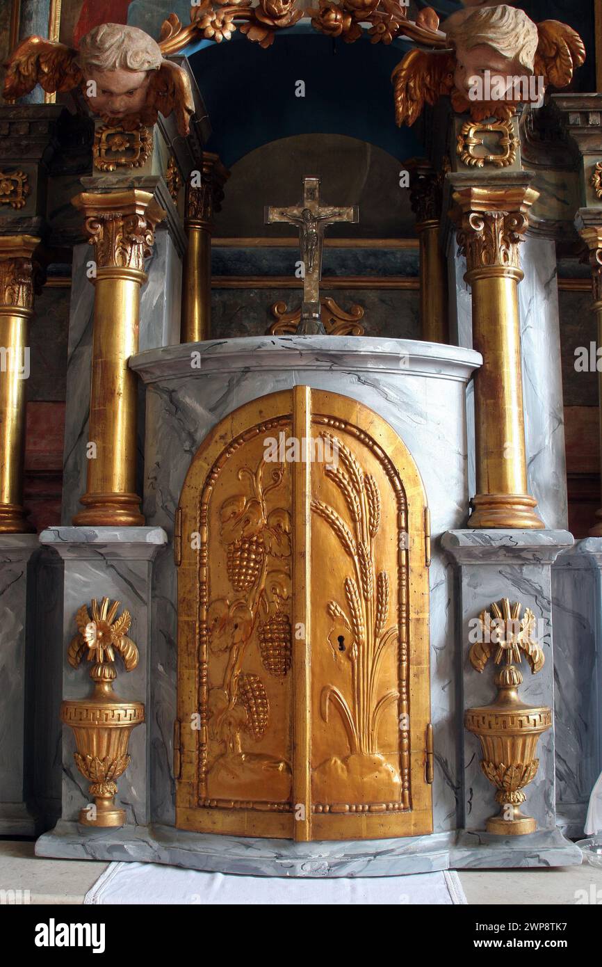 Tabernacle on the main altar in the church of Holy Trinity in Klenovnik, Croatia Stock Photo