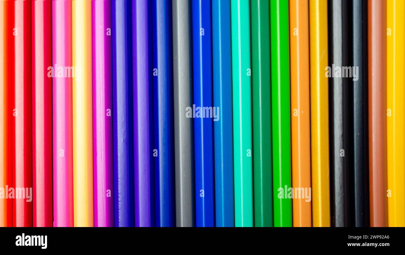 Set of colored pencils on a white background That is arranged in a bar ...
