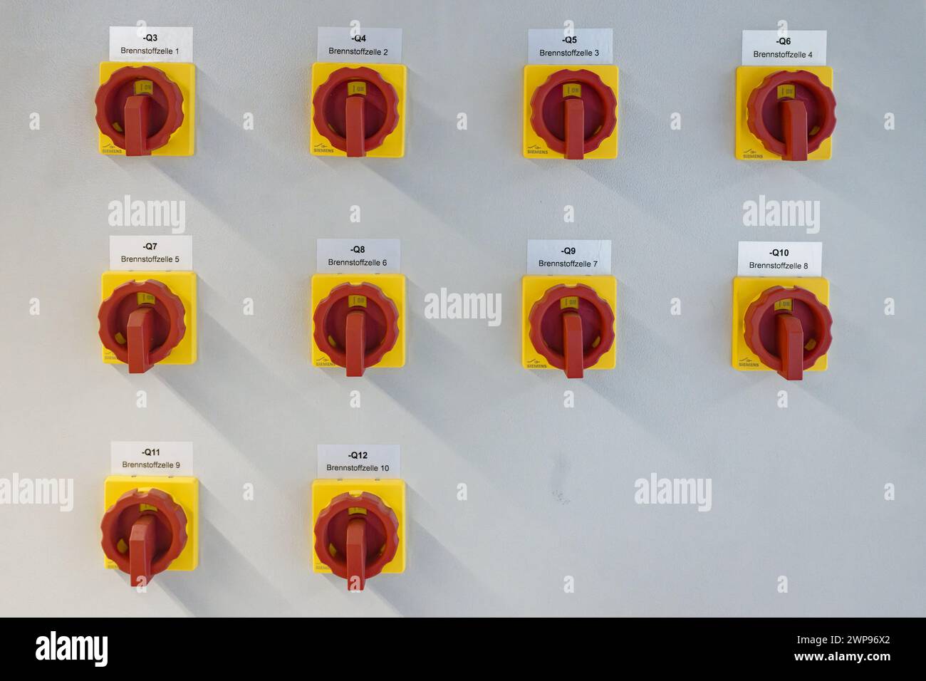 06 March 2024, North Rhine-Westphalia, Erkelenz: On/off switches for ...