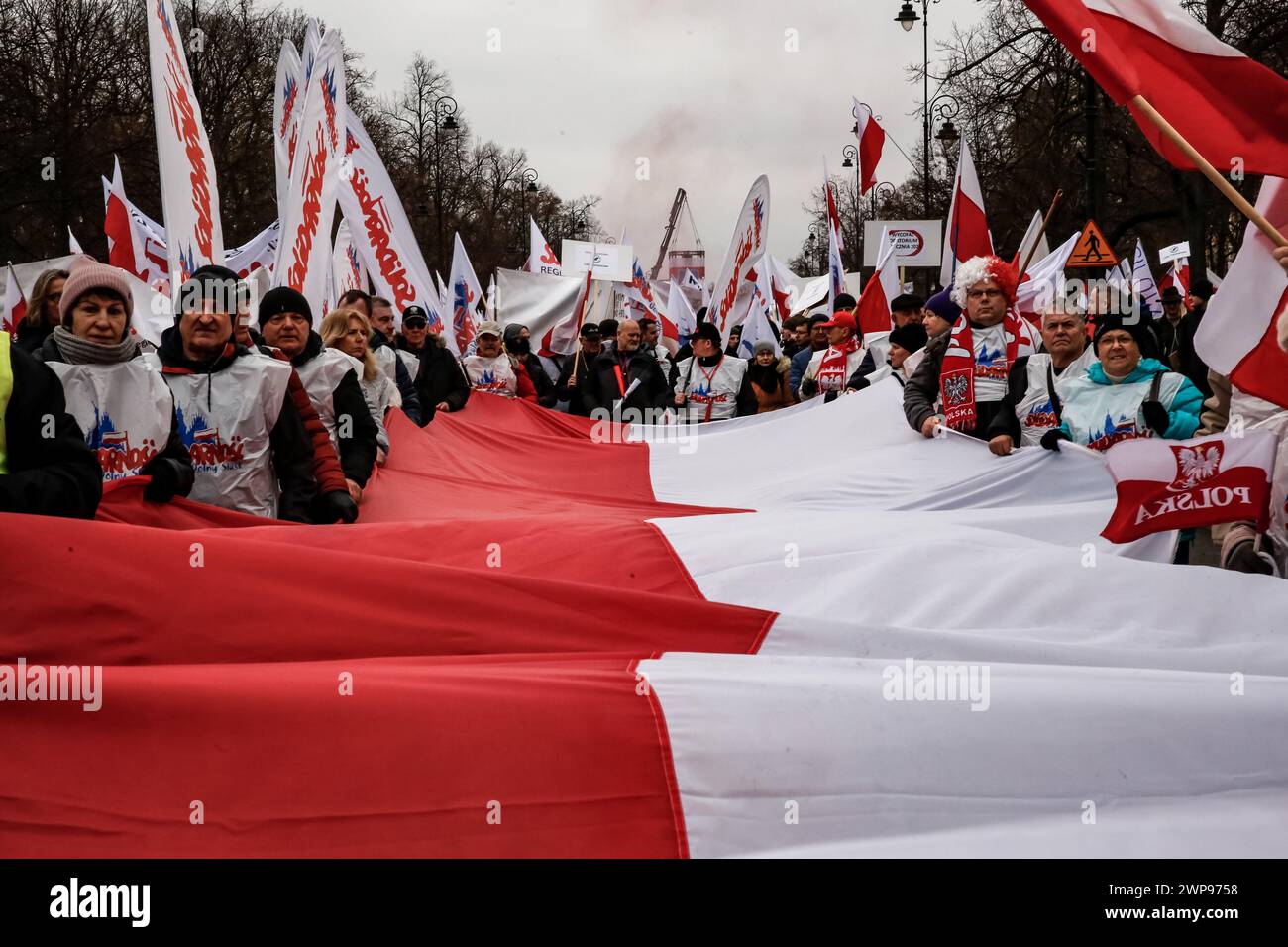Polish farmers take to the streets with Polish flags  and anti government banners to protest against EU Green Deal and an import of agricultural goods from non-EU countries, including Ukraine, in front of Prime Minister Cancellary in the centre of Warsaw, the capital of Poland on March 6, 2024. Stock Photo