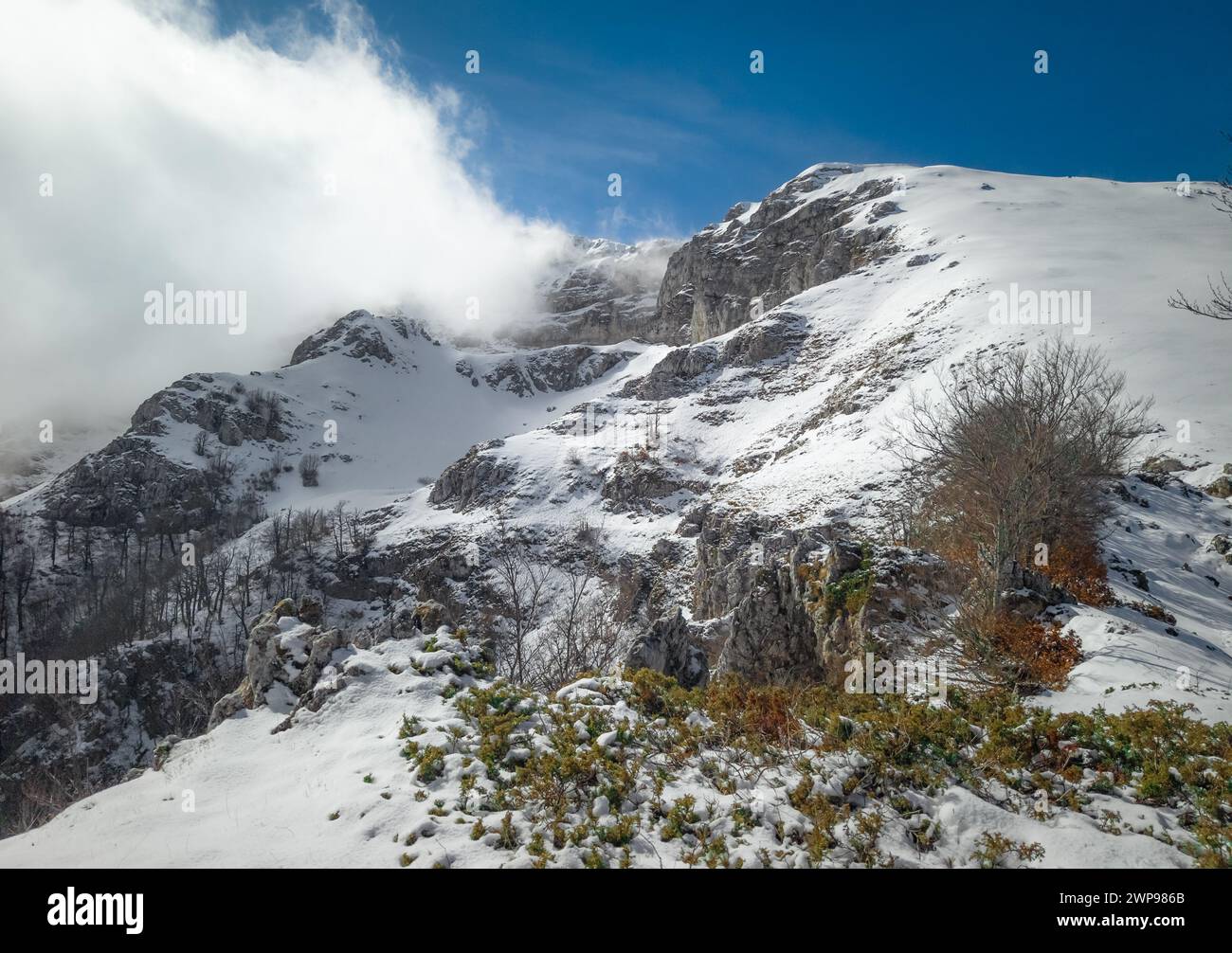 Mount Cantari (Lazio, Italy) - In the Monti Simbruini mountain range with Monte Viglio, province of Frosinone, here in winter with snow and alpinist. Stock Photo