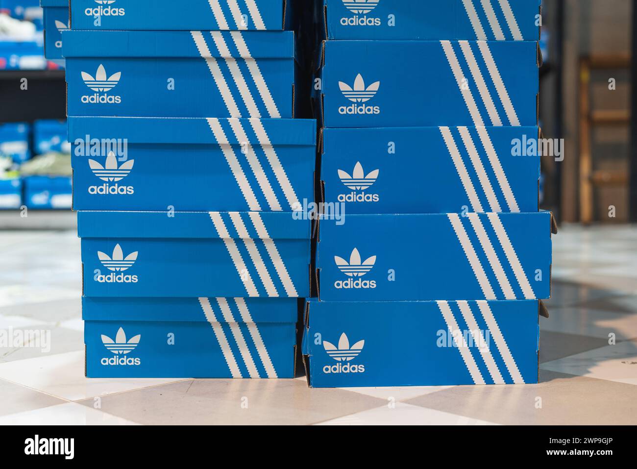 Adidas signature blue boxes on the floor on March 3, 2024, in Bangkok, Thailand. Stock Photo
