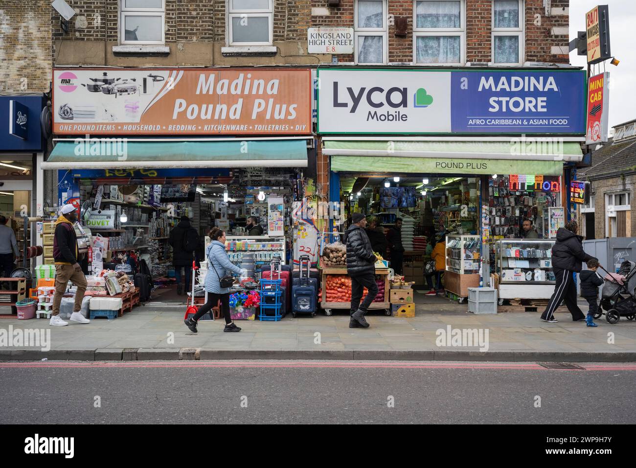 London, UK.  6 March 2024. People pass shops in Dalston, East London, as Jeremy Hunt, Chancellor of the Exchequer, delivers his Budget speech to MPs in the House of Commons.  Credit: Stephen Chung / Alamy Live News Stock Photo