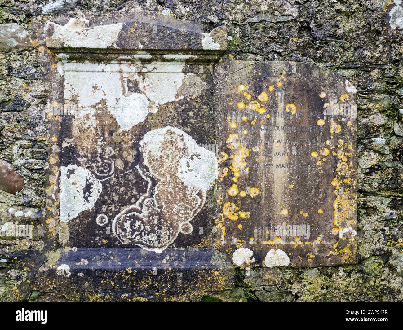 An old tomb stone attached to Kilnave Chapel on Loch Gruinart, Islay, Scotland, UK, that was built around late 1300's. Stock Photo