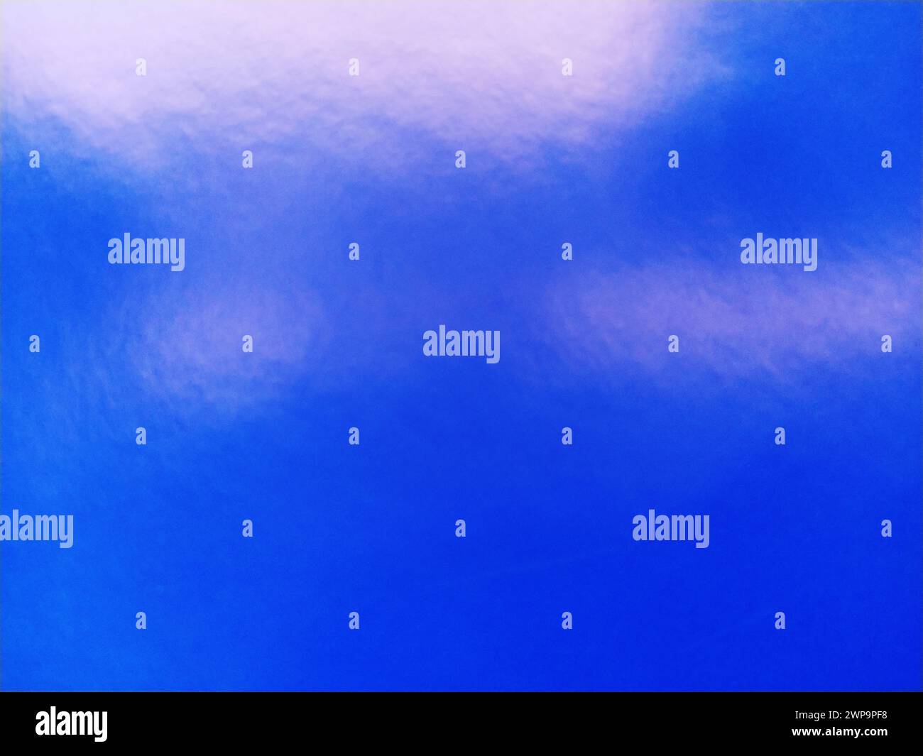 Smooth gradient background, blue texture. Colored paper with a pink metallic sheen. Stock Photo