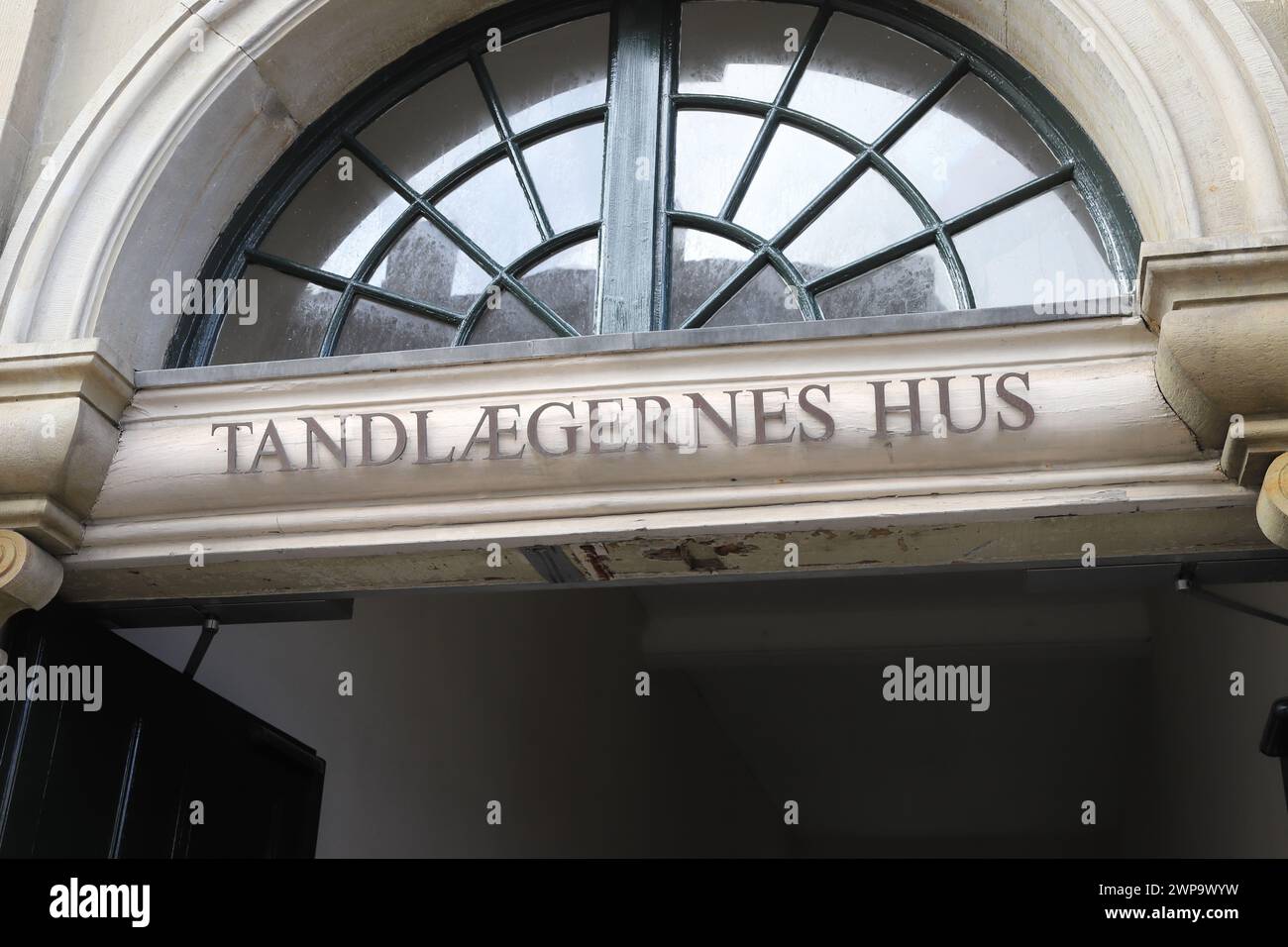 Copenhagen, Denmark - October 22, 2023: Close up view of the signage for the Danish Dental Association office at 17 Amaliegade street. Stock Photo