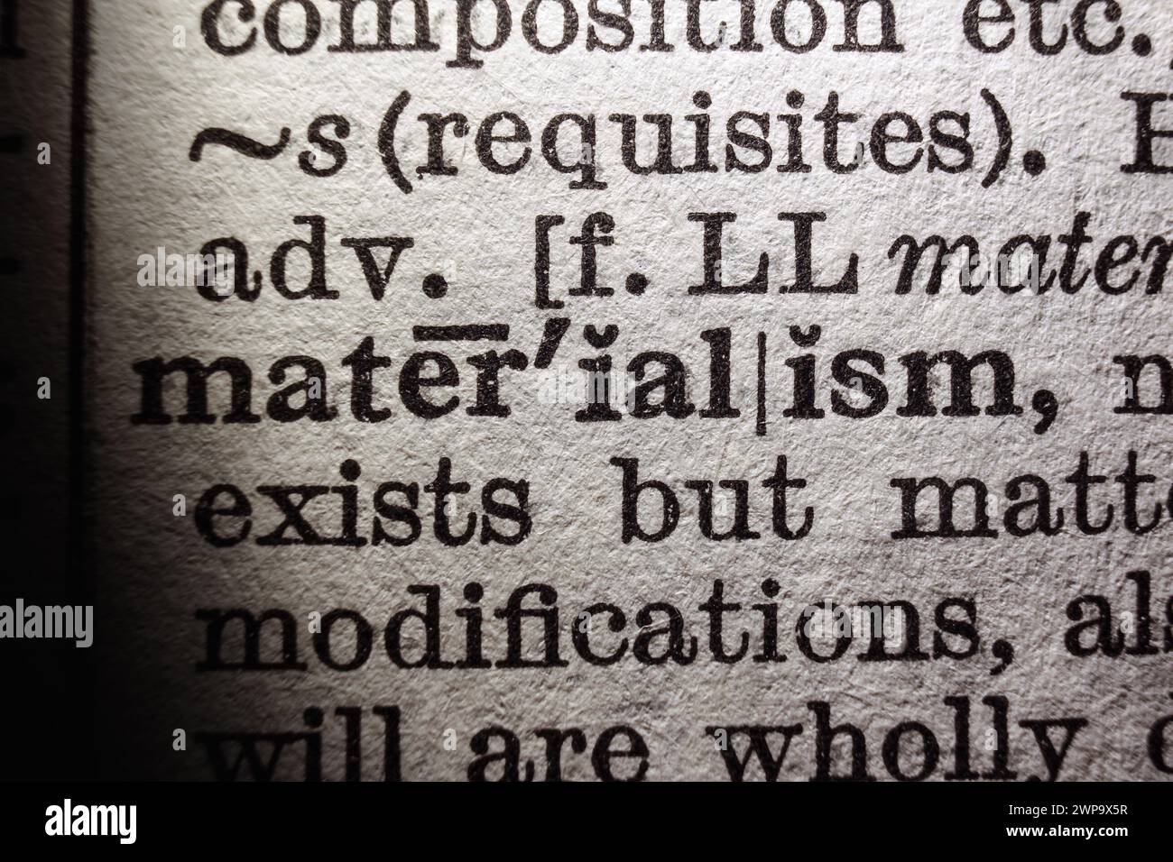 Word materialism on dictionary page, macro close-up Stock Photo