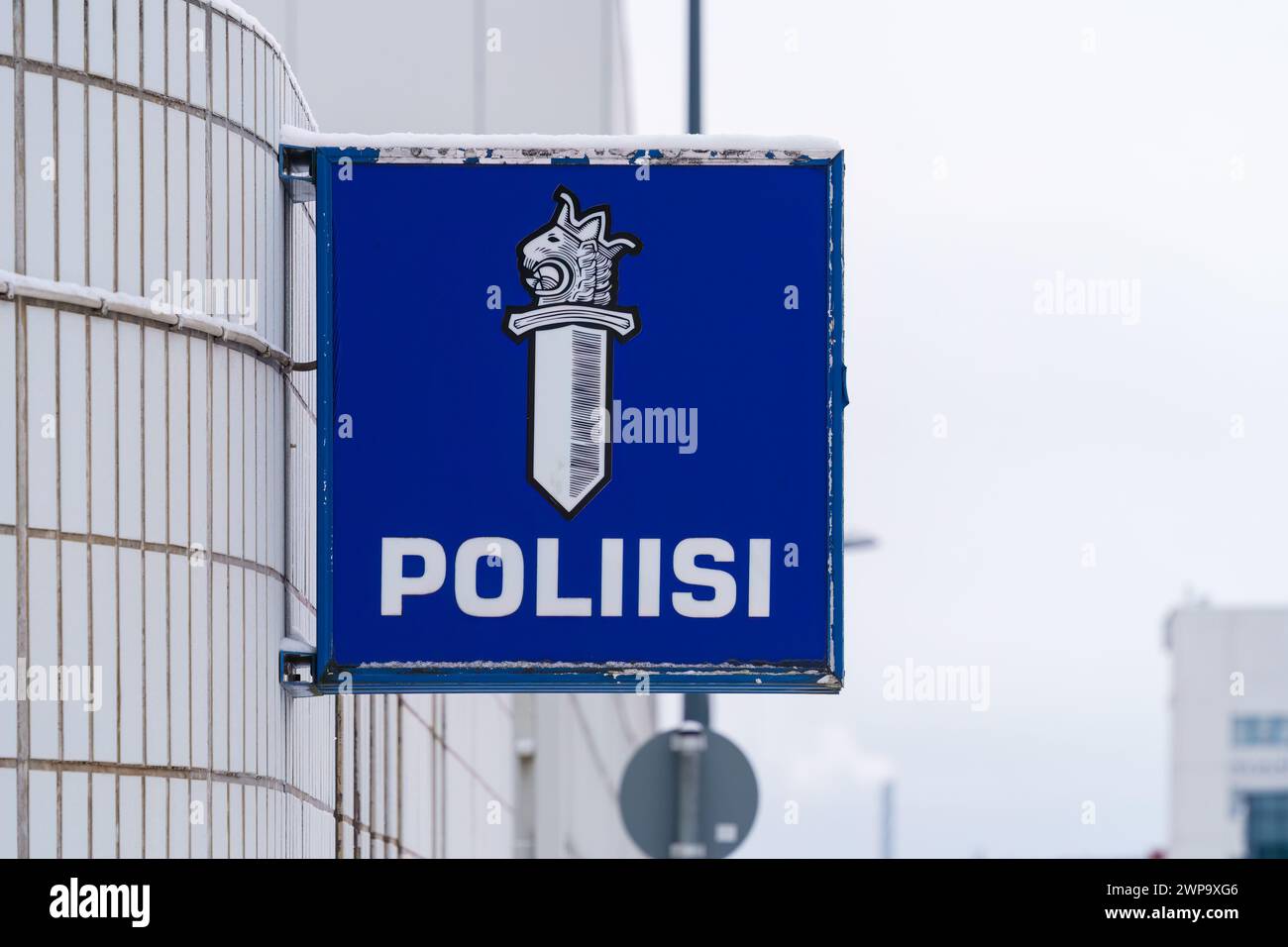 Sign with official finnish police logo and the word poliisi (police) outside the police station in Tampere, Finland. January 27, 2024. Stock Photo
