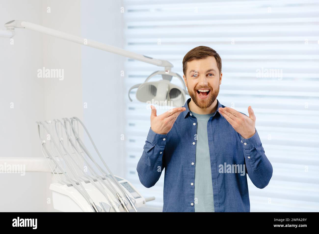 Toothy smile standing hi-res stock photography and images - Alamy