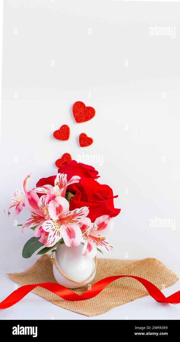 Bouquet of flowers and red heart Stock Photo - Alamy
