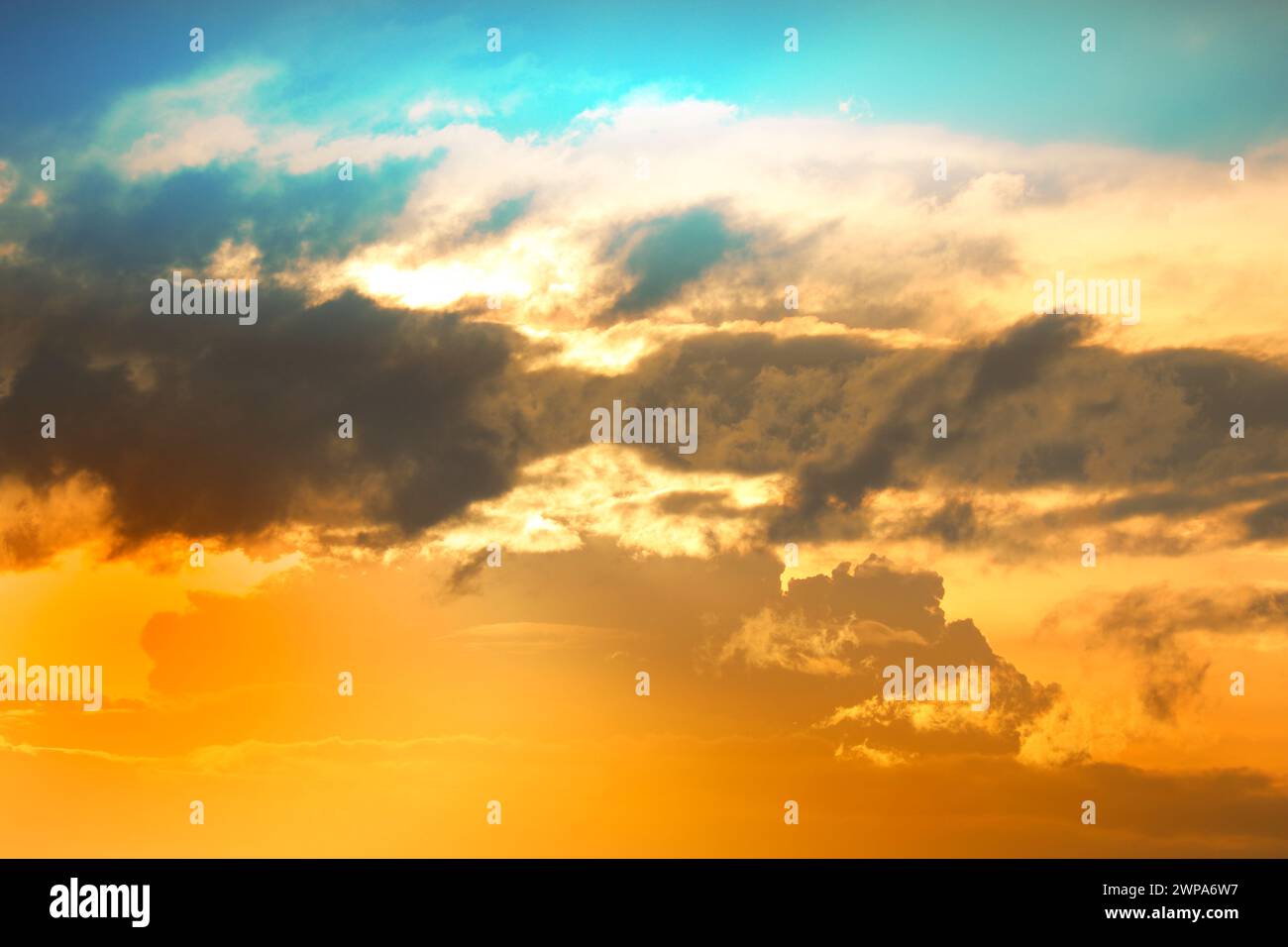 Colorful sky at dawn with cirrus and cumulus clouds Stock Photo