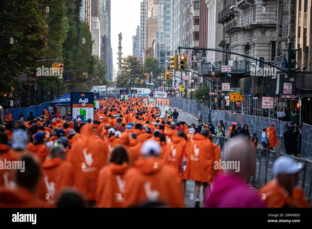 Finisher runners with thermal blankets having just finished the marathon in Central Park and