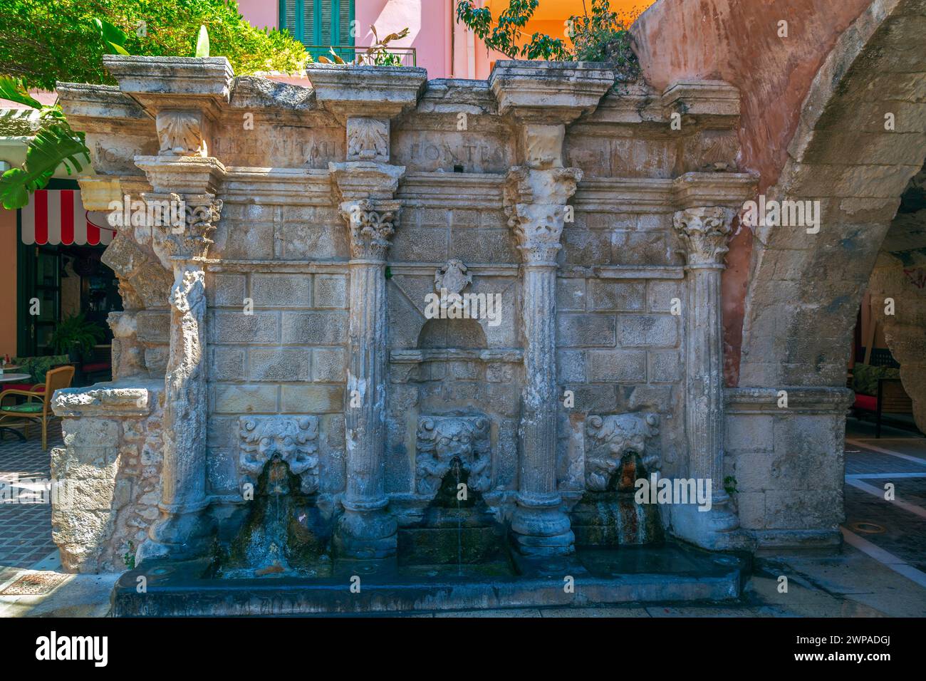 The Rimondi Venetian fountain, Rethymno, Crete, Greece. Was built in 1626 by the city's Rector A. Rimondi. Located in Plateia Petichaki. Latin inscrip Stock Photo