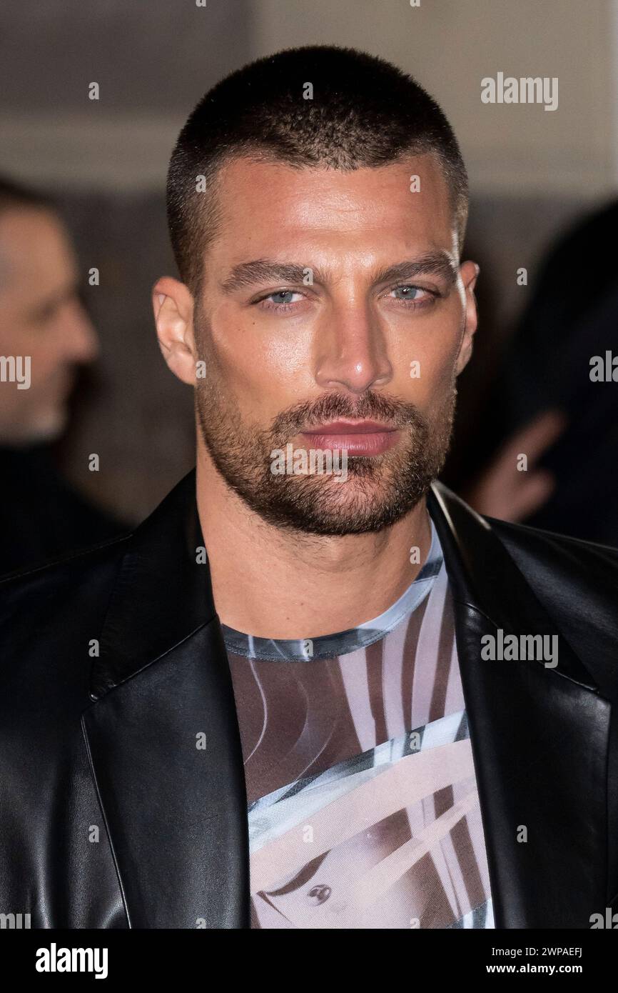 Simone Susinna arrives for the Mugler Fall/Winter 2024 2025 ready to