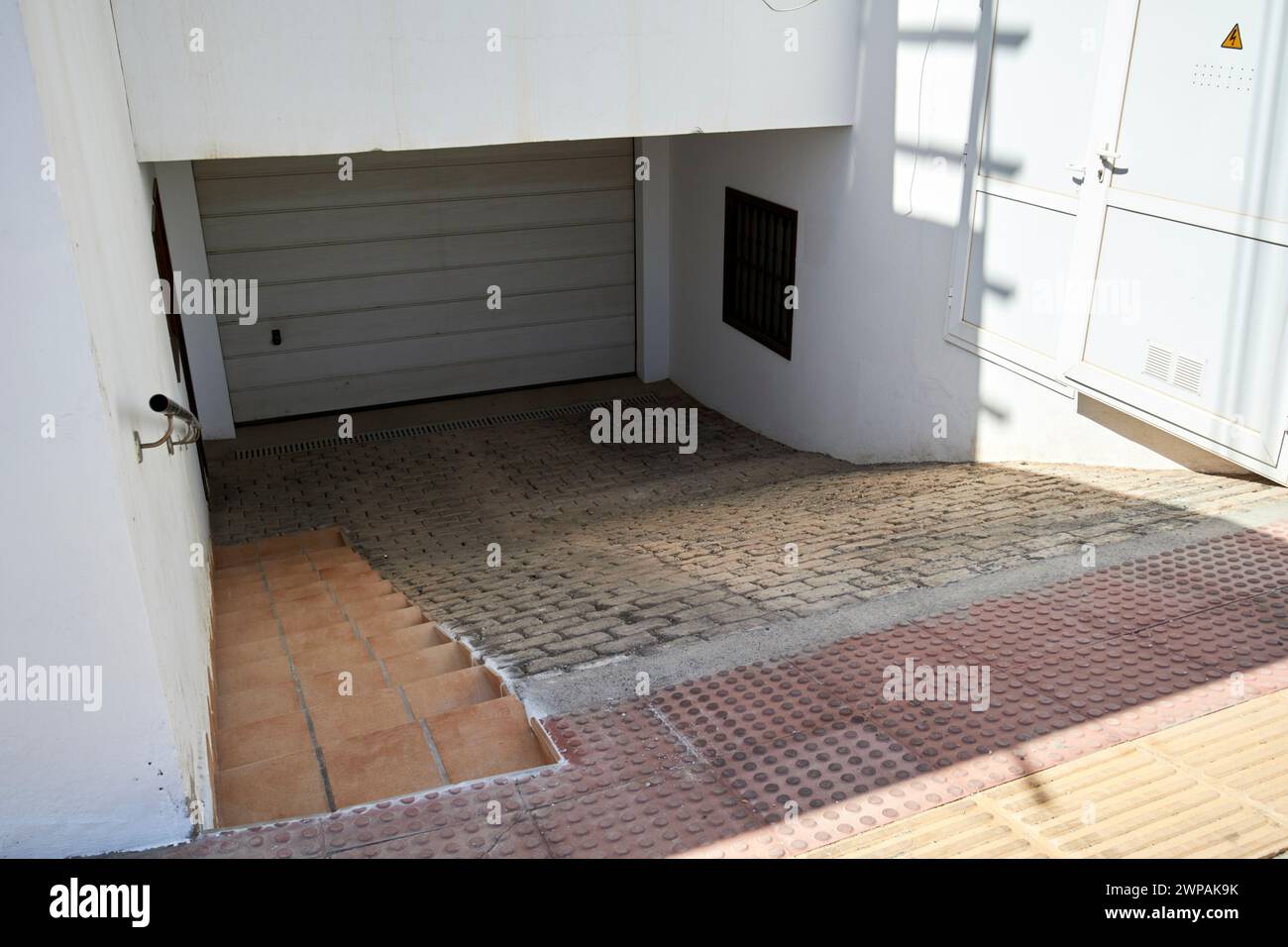 ramps and steps down to underground garage parking in traditional villa house Playa Honda, Lanzarote, Canary Islands, spain Stock Photo