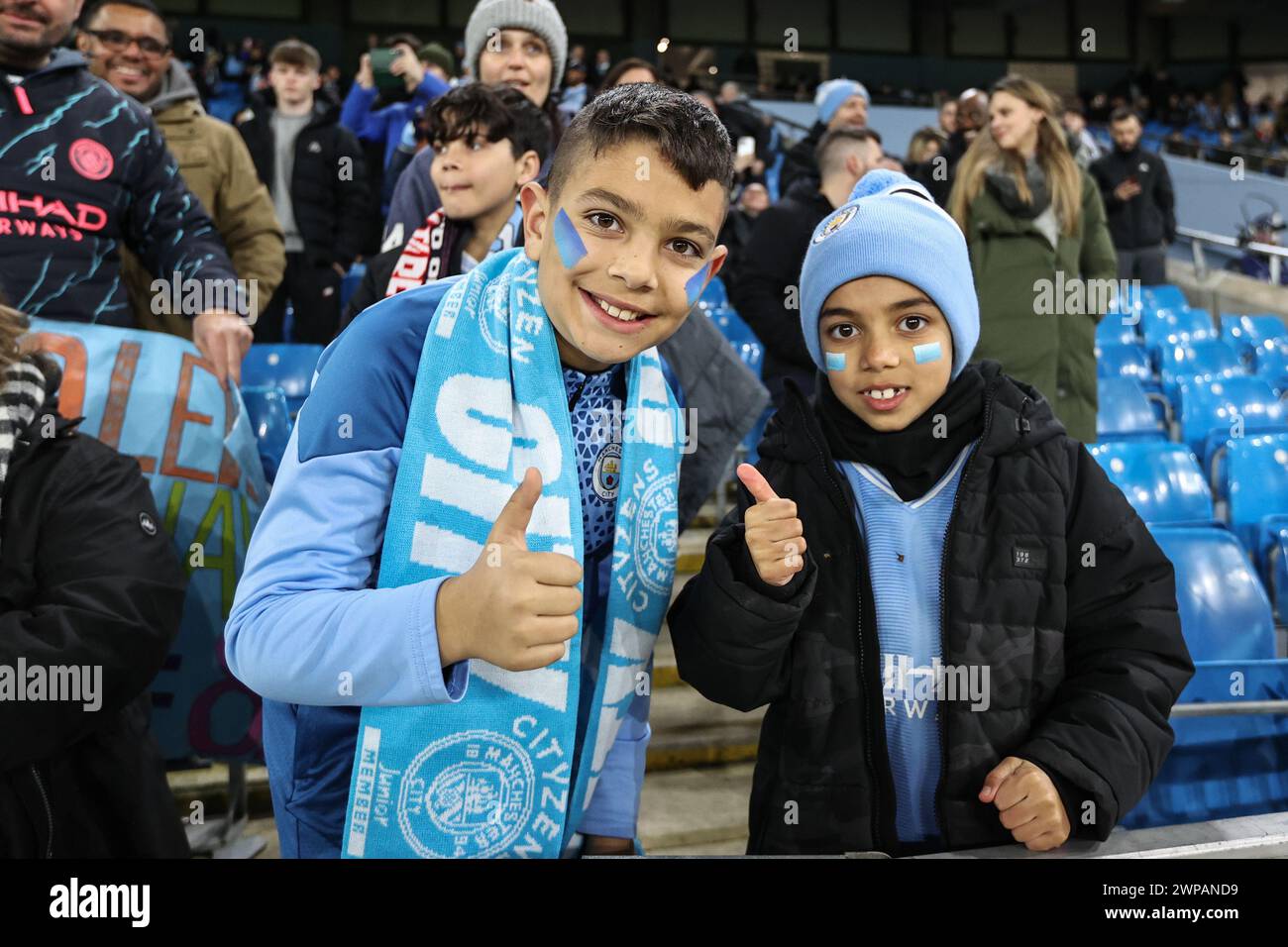 Fans at the Etihad during the UEFA Champions League match Manchester City vs F.C. Copenhagen at Etihad Stadium, Manchester, United Kingdom, 6th March 2024  (Photo by Mark Cosgrove/News Images) Stock Photo