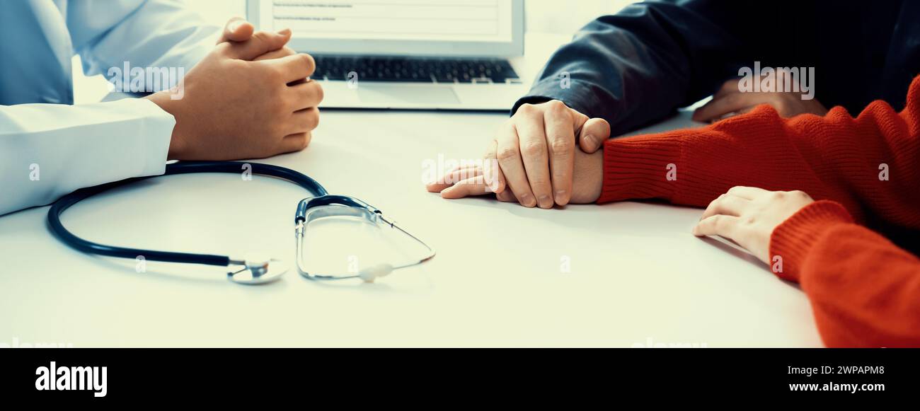 Couple attend fertility or medical consultation with gynecologist at hospital as family planning