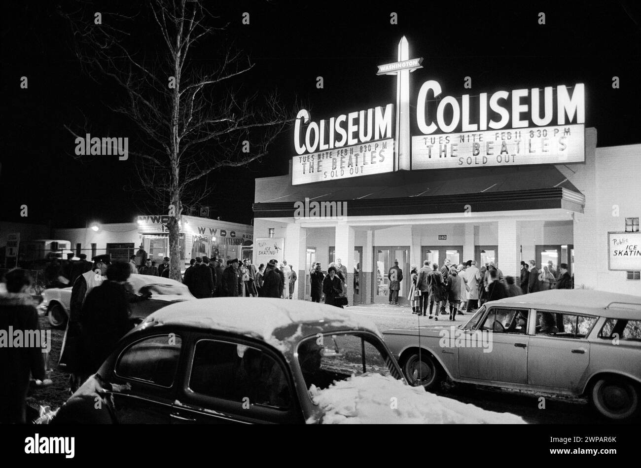 English rock and roll band The Beatles performing at Washington Coliseum, Washington, D.C., USA, Marion S. Trikosko, U.S. News & World Report Magazine Photograph Collection, February 11, 1964 Stock Photo