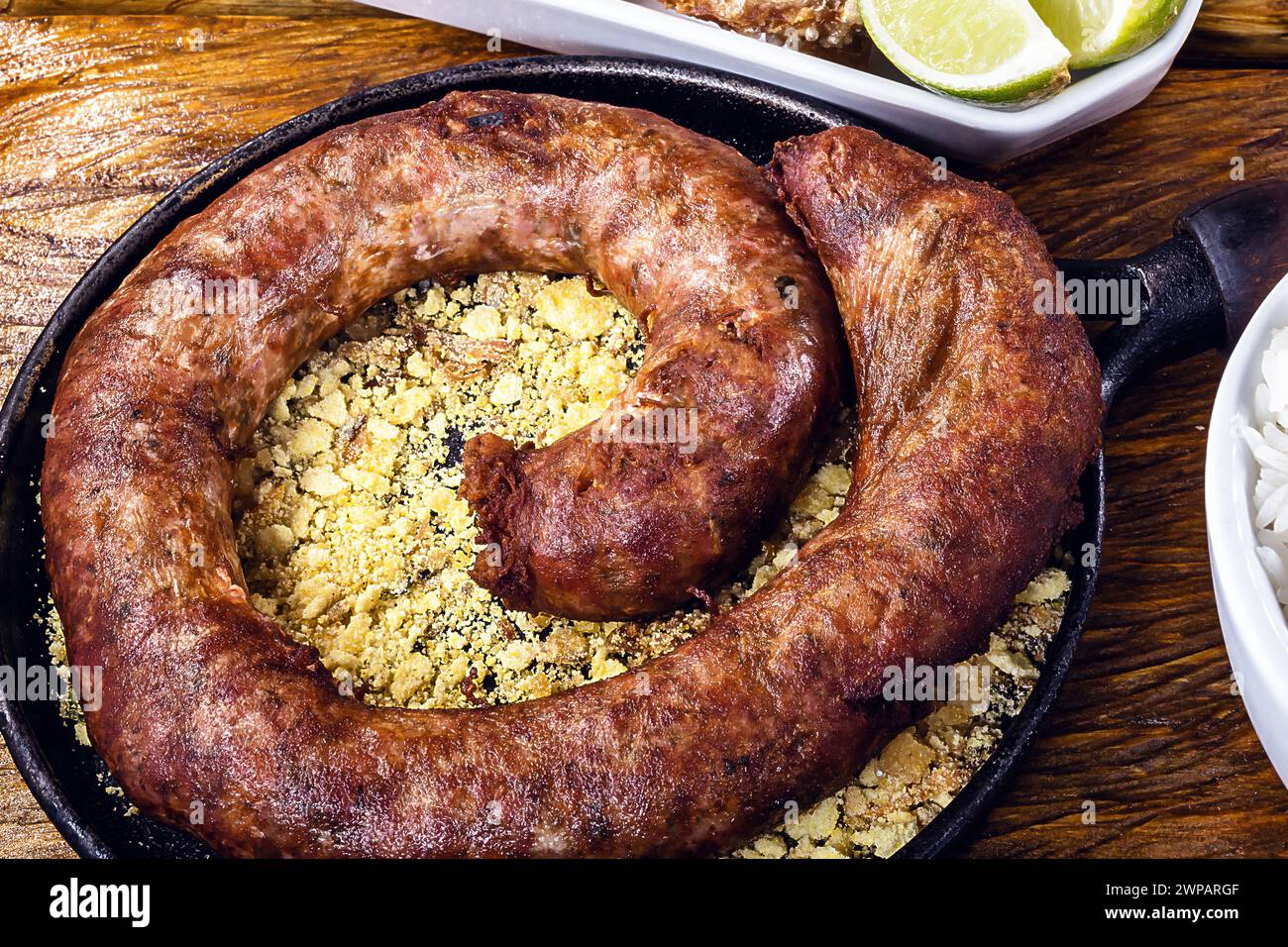 Typical food table in the interior of Brazil. Pork, beans, bean tutu