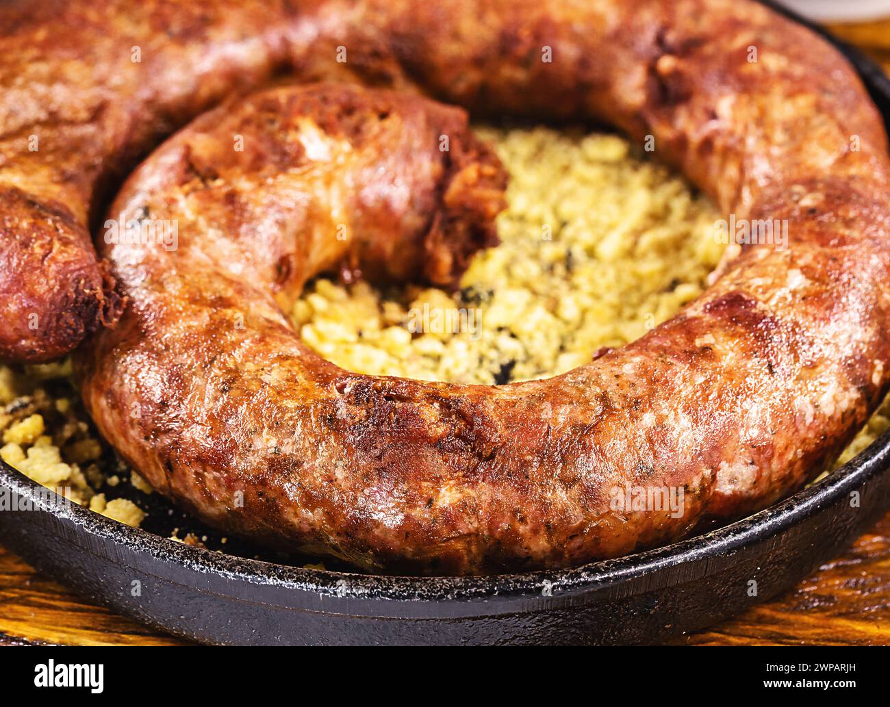 Typical food table in the interior of Brazil. Pork, beans, bean tutu