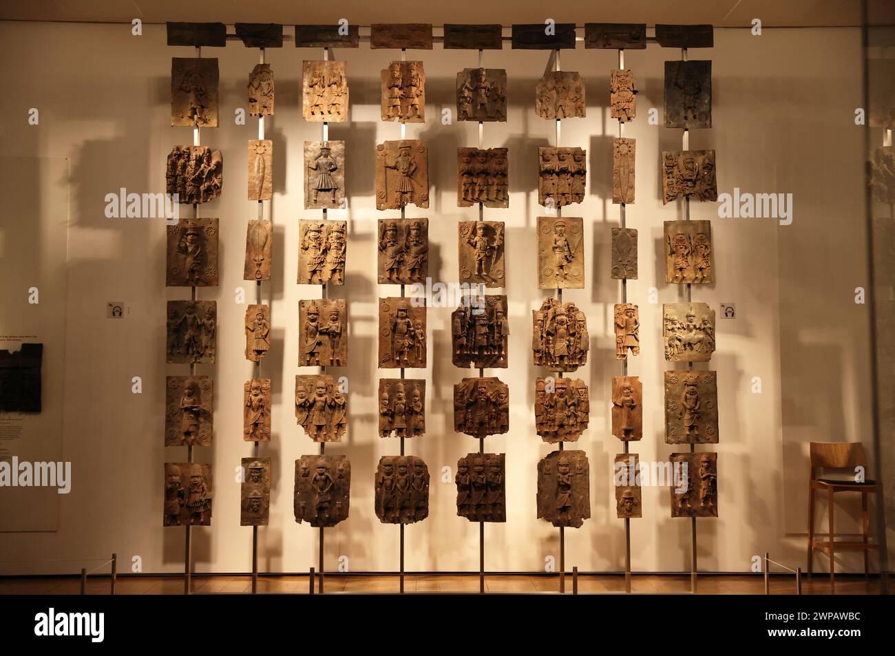 The Benin Bronzes, plaques made in the West African Kingdom of Benin 1550-1650,  to decorate the Oba's palace. The British attacked Benin City in 1897. Stock Photo