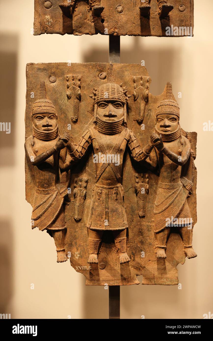 The Benin Bronzes, plaques made in the West African Kingdom of Benin 1550-1650,  to decorate the Oba's palace. The British attacked Benin City in 1897. Stock Photo