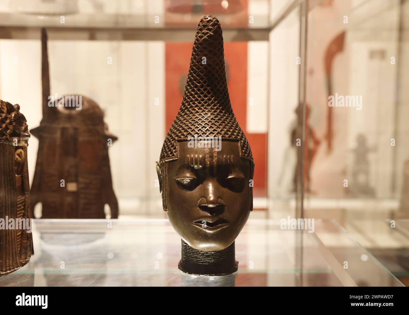Head of a Queen Mother, in cast brass, from Benin, Nigeria, 16th century, for a special altar within the royal city, in the British Museum, London, UK Stock Photo