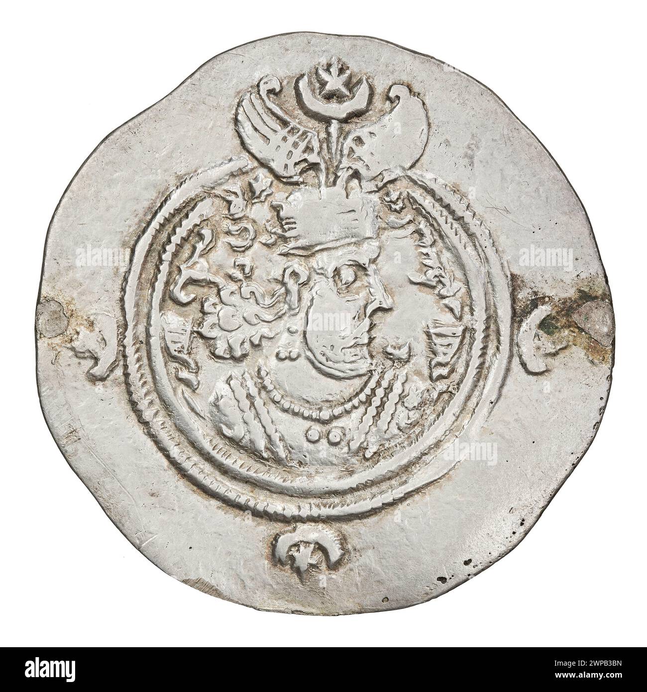 Silver drachma coin issued under Chosroes II of Western Persia, dating from 591 to 628, used as currency in the Sasanian Empire. Stock Photo