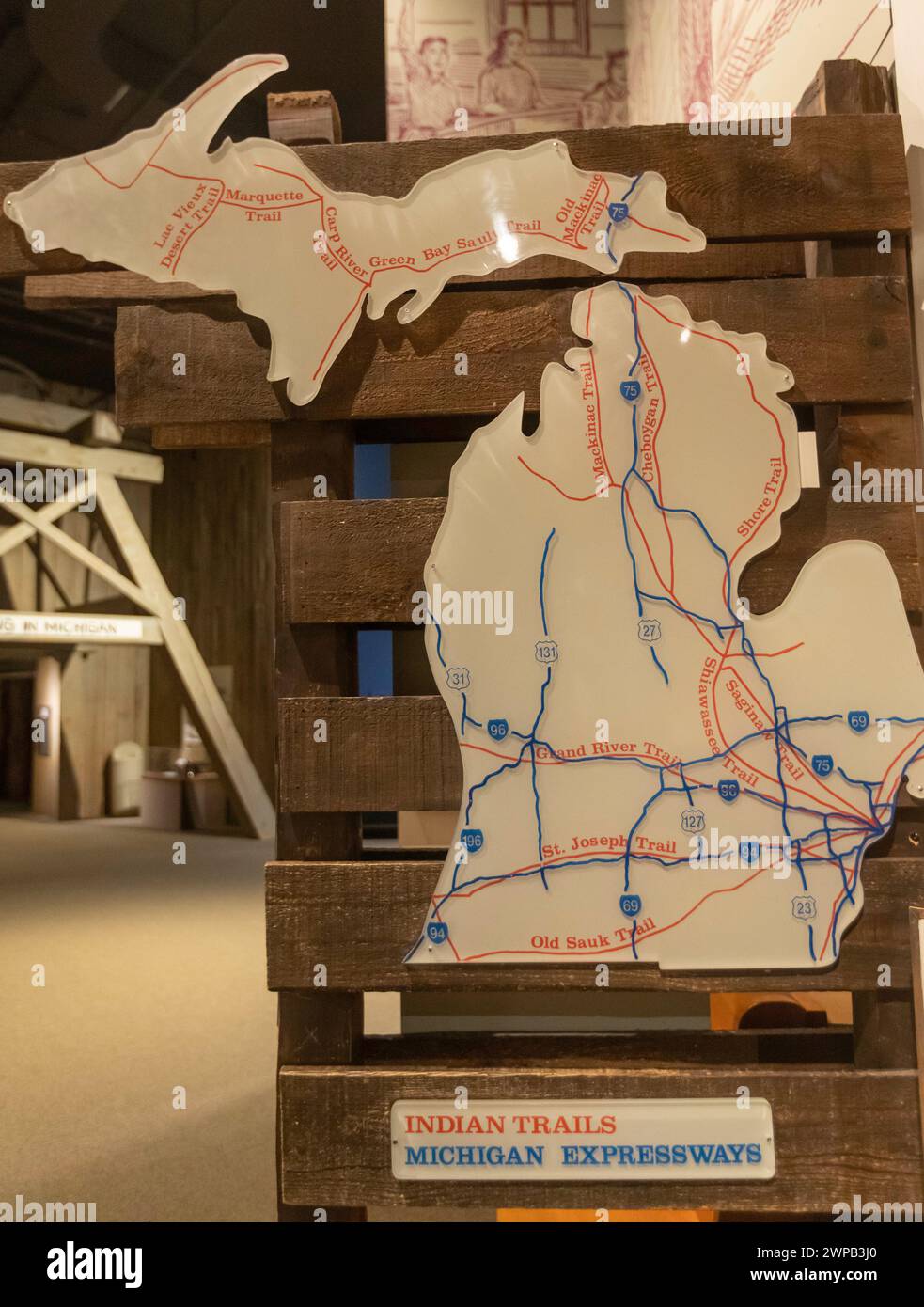 Lansing, Michigan - The Michigan History Museum. A map compares trails used by Native Americans with the routes of modern expressways. Stock Photo