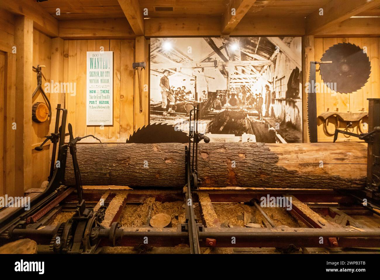 Lansing, Michigan - The Michigan History Museum. A log is cut in a ...