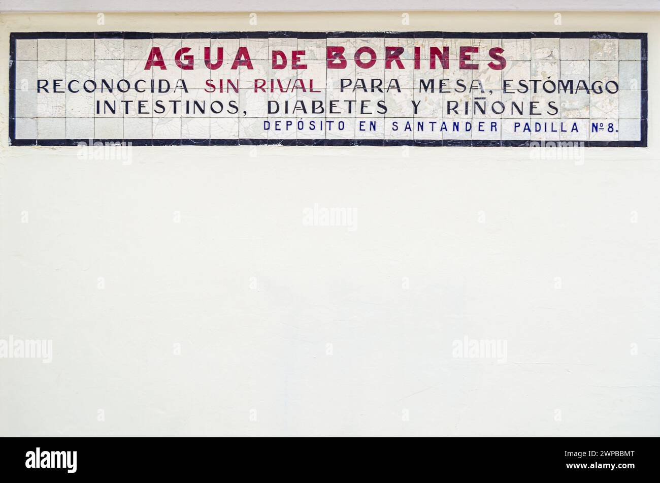 SANTANDER, SPAIN - MAY 1, 2014: Ceramic advertising mural of Agua de Borines, located on the facade of the Mercado del Este in Santander, Spain, made Stock Photo