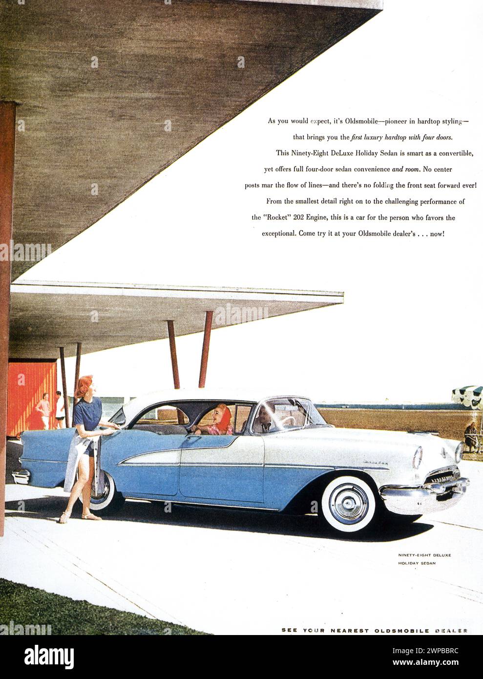 1955 Oldsmobile Ninety-Eight Deluxe Holiday Sedan Print Ad Stock Photo