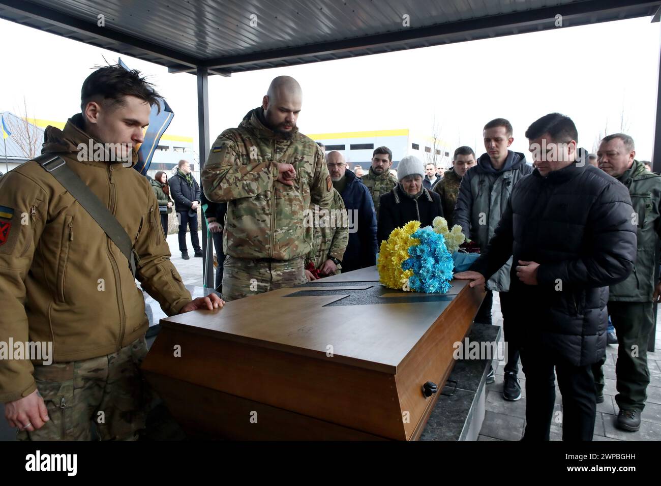 Non Exclusive: BUCHA, UKRAINE - MARCH 5, 2024 - Members of the public pay their last respects during the memorial service for Ukrainian defender Danii Stock Photo