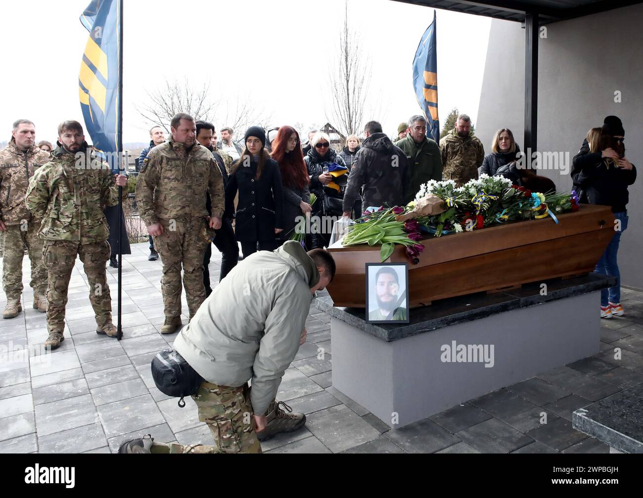 Non Exclusive: BUCHA, UKRAINE - MARCH 5, 2024 - Members of the public pay their last respects during the memorial service for Ukrainian defender Danii Stock Photo