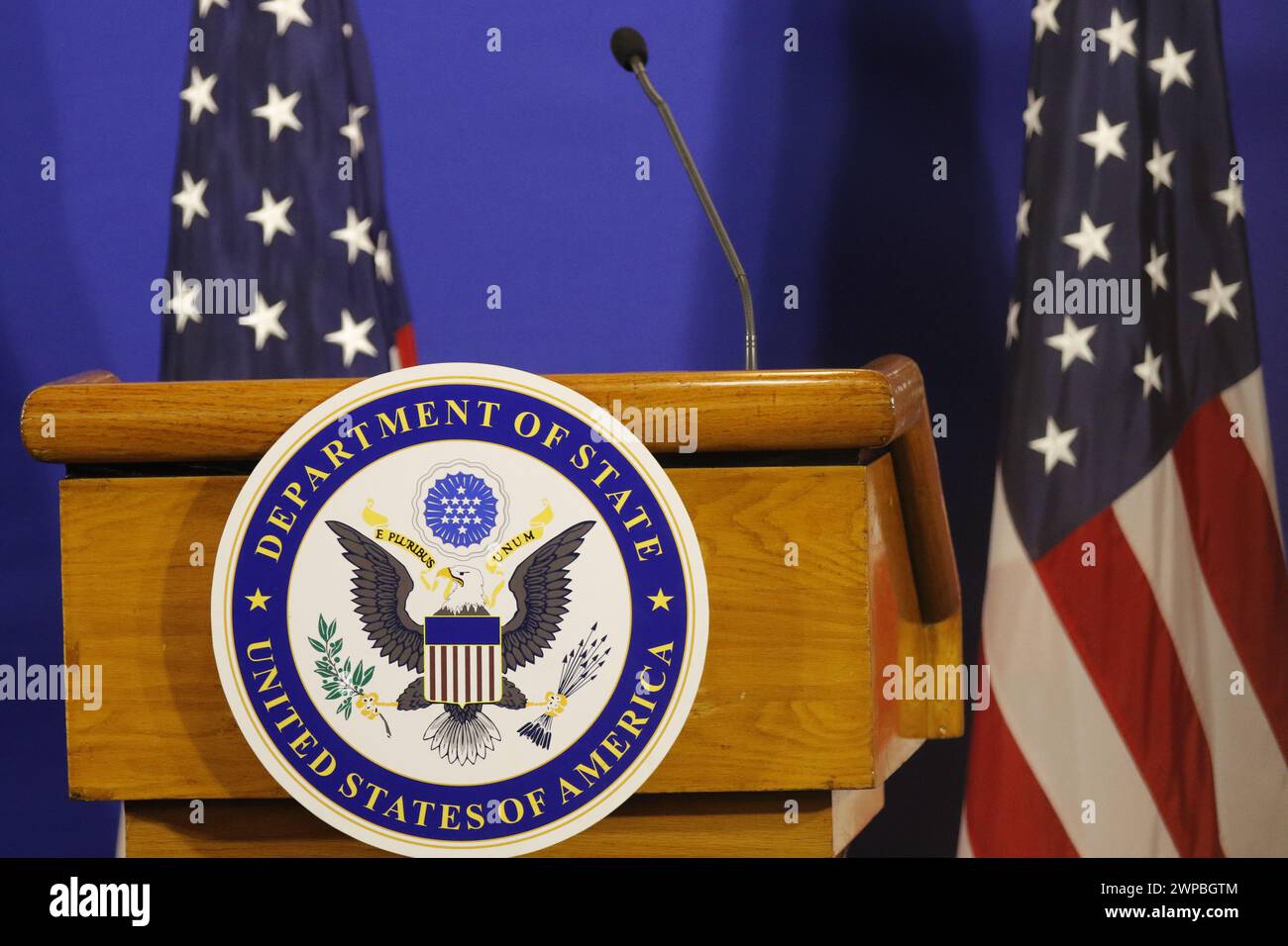 United States of America Department of State logo and flag on stage for press conference announcement - Rio de Janeiro, Brazil 02.22.2024 Stock Photo