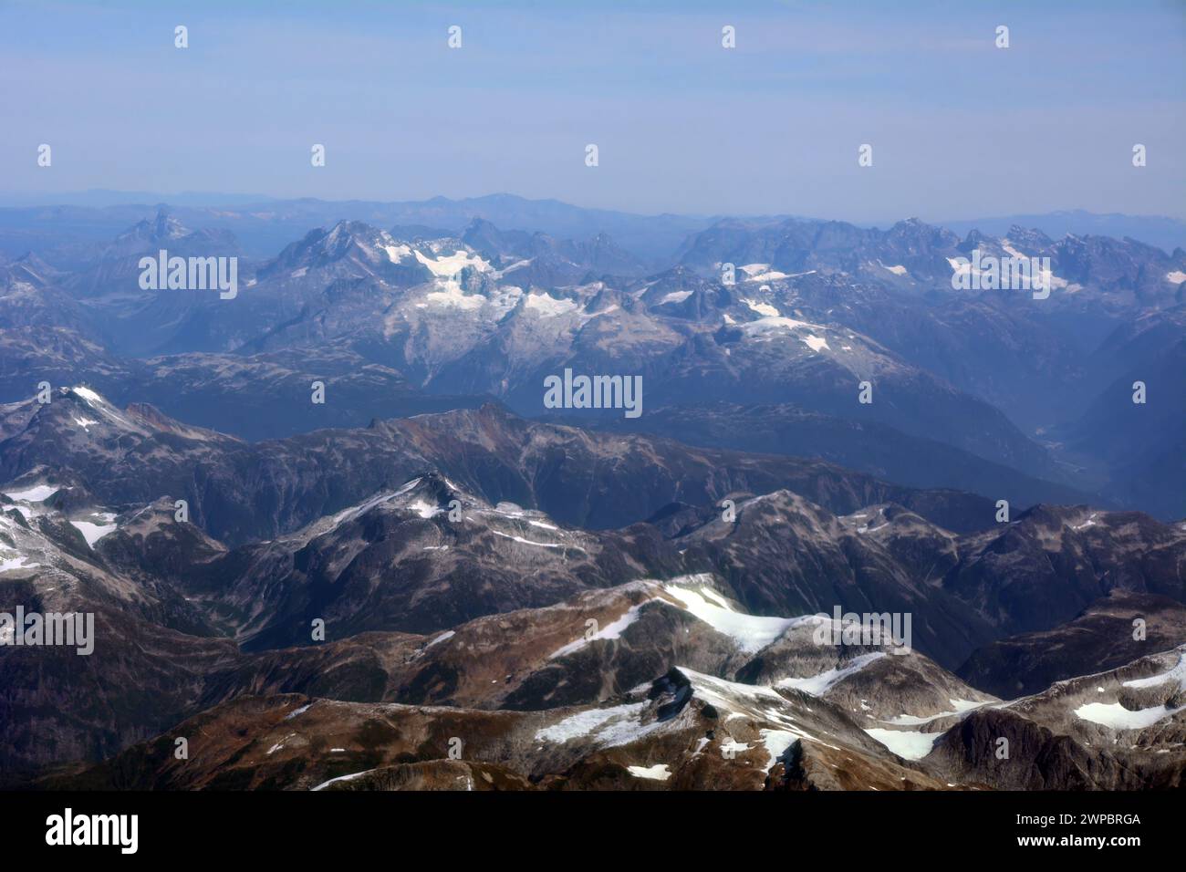 Aerial view of British Columbia's Coast Mountains at the end of summer showing glacial melt and retreat, near Bella Coola, British Columbia, Canada. Stock Photo