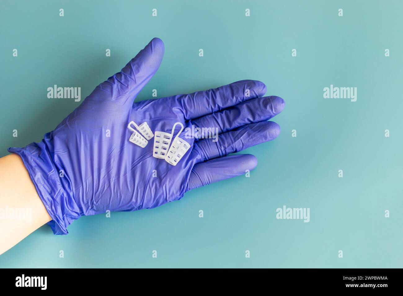 Doctor Holds Anti Snoring Device. Flatly Nose Relief Nasal Dilator