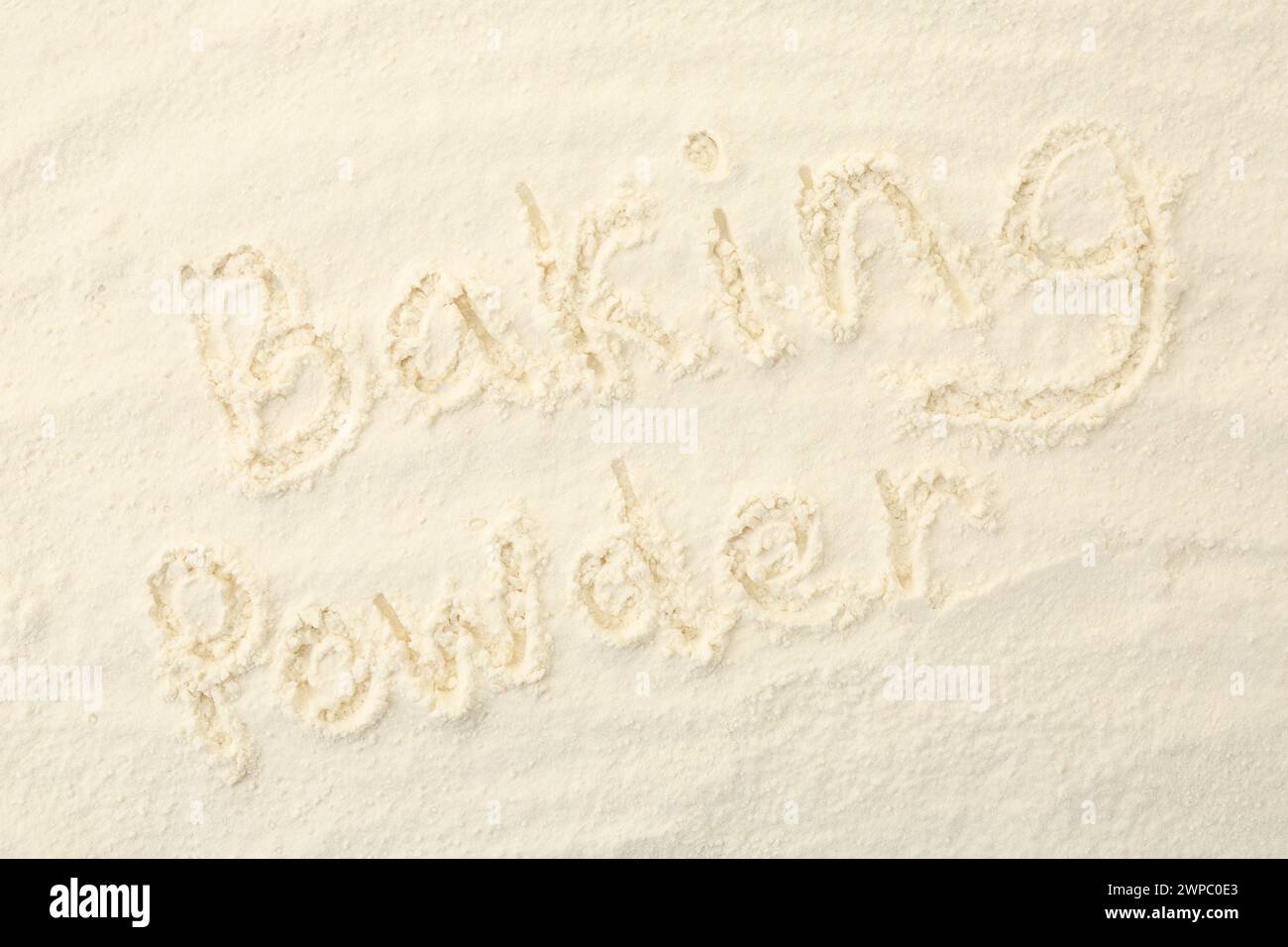 Words Baking Powder written on powder, top view Stock Photo - Alamy