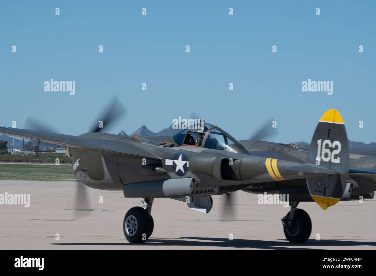 A P-38 Lightning aircraft taxis during the Heritage Flight Training Course at Davis-Monthan Air Force Base, March 1, 2024 Stock Photo