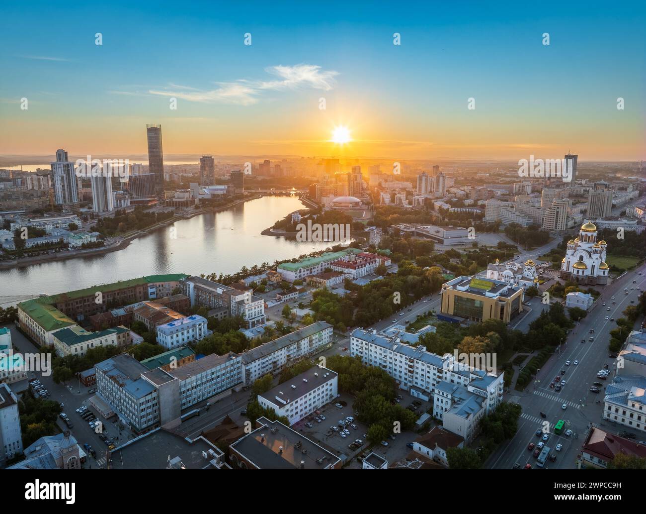 Yekaterinburg city and pond aerial panoramic view at summer sunset ...