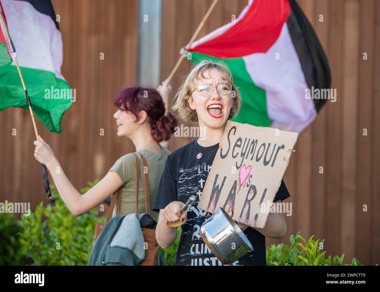 Christchurch, New Zealand. 7th Mar, 2024. New Zealand Act Party leader David Seymour is met with pro-Palestine demonstrators waving flags, chanting, and banging pots and pans to symbolize the starvation taking place in Gaza, as he attends a meeting at Business Canterbury. (Credit Image: © PJ Heller/ZUMA Press Wire) EDITORIAL USAGE ONLY! Not for Commercial USAGE! Stock Photo