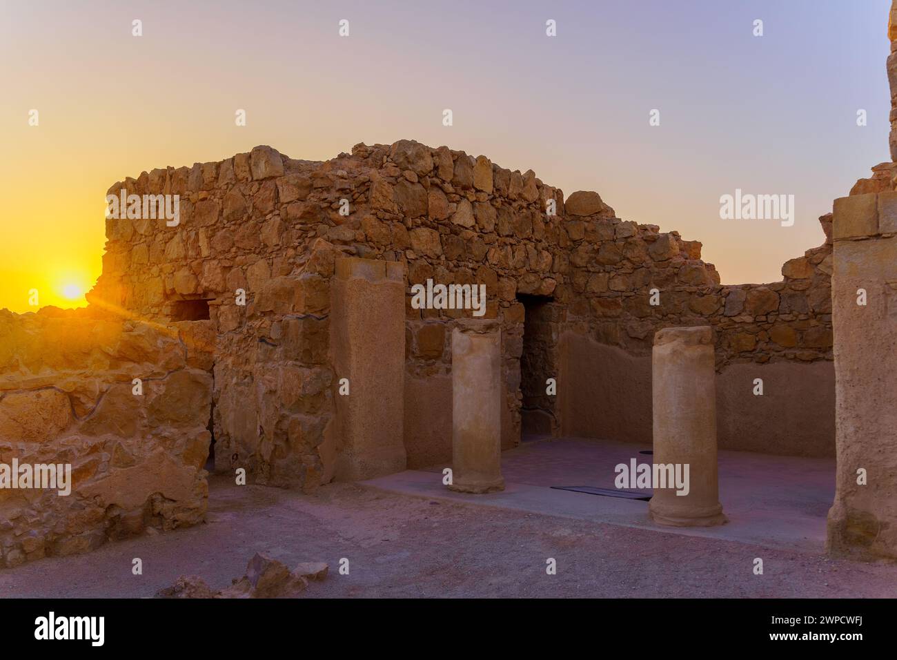 Sunrise view of the ruins of the Masada Fortress and the Dead Sea, Judaean Desert, southern Israel Stock Photo