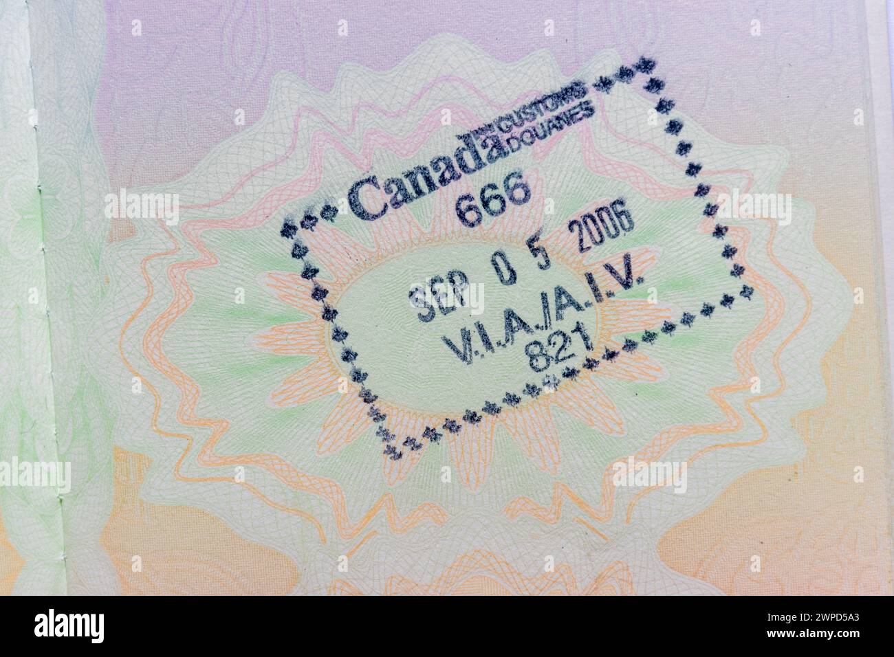 Canada stamp in British passport Stock Photo