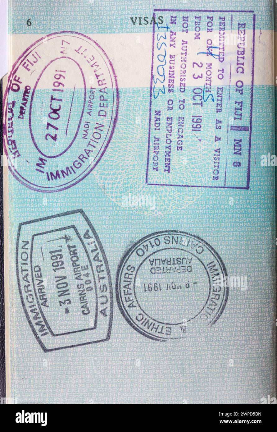 Entry and exit stamps in British passport for visits to Australia and Fiji Stock Photo