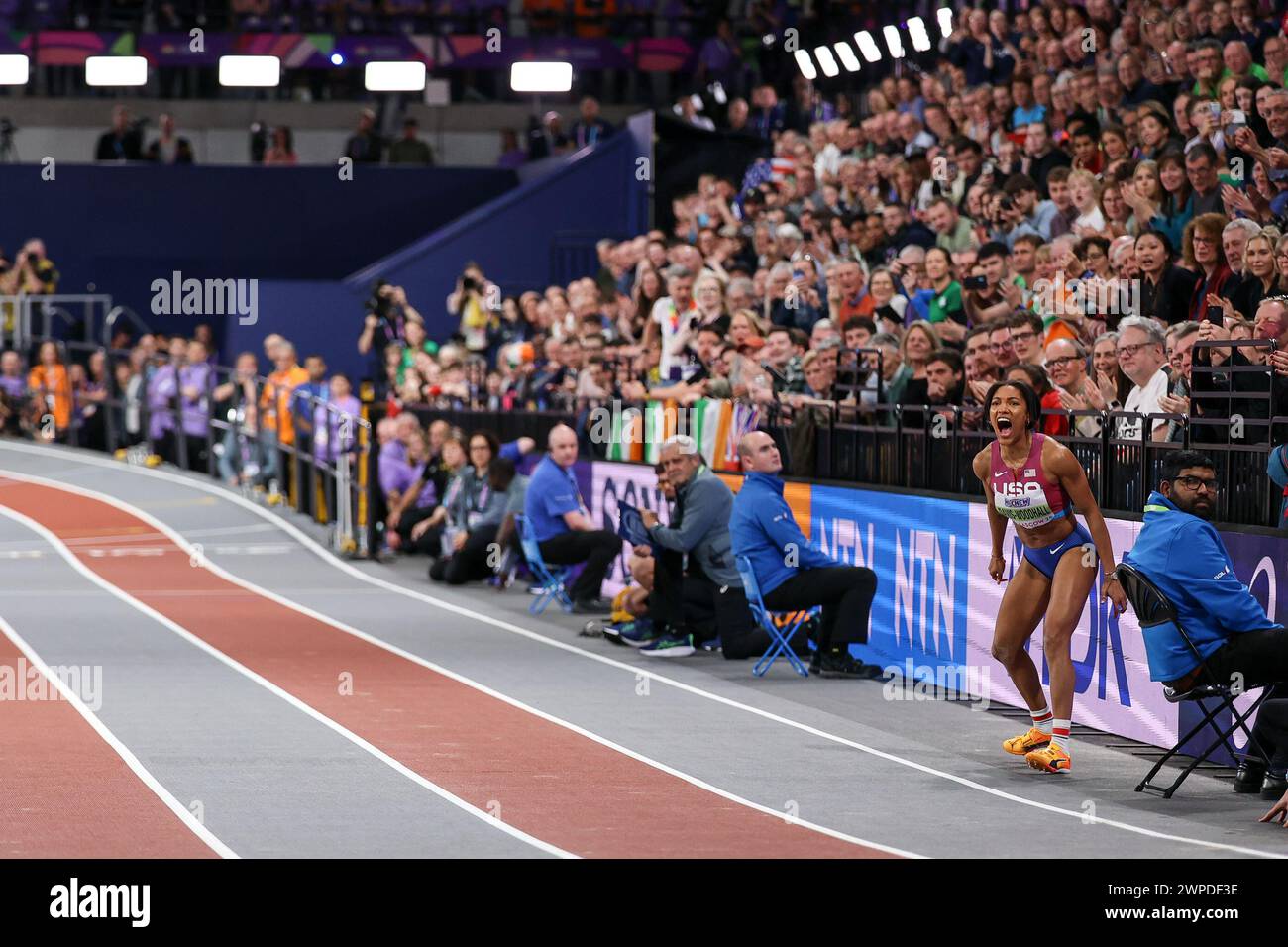 Tara DavisWoodhall (USA, Long Jump) cheers on the men's USA 4x400m