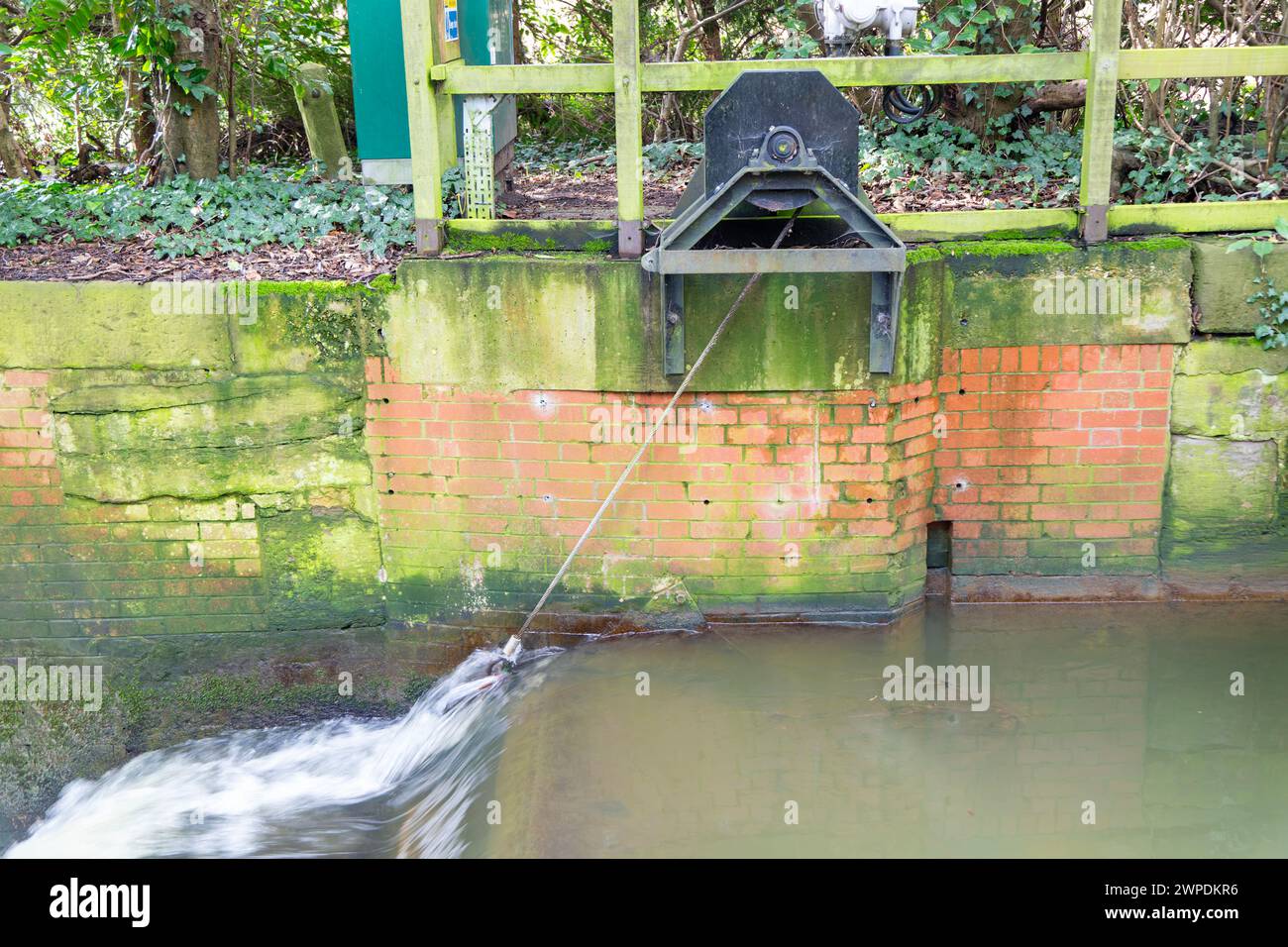 Water flow monitoring equipment gauging station, River Gipping, Sproughton, Suffolk, England, UK Stock Photo