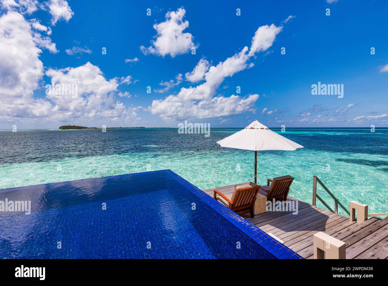 Beautiful travel sea landscape, luxury romantic beach holidays for honeymoon couple, tropical vacation in luxurious hotel resort. Amazing calm sea sky Stock Photo